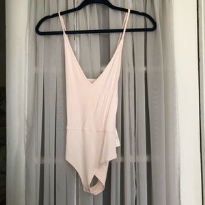 Light Pink Ribbed Bodysuit